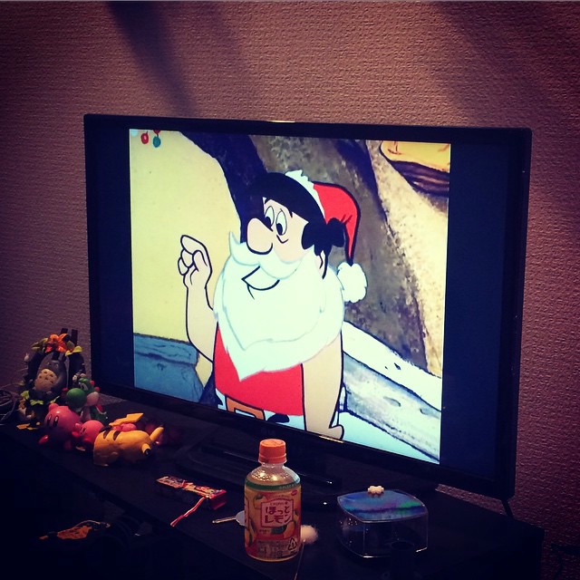 A TV showing a Flintstones Christmas.