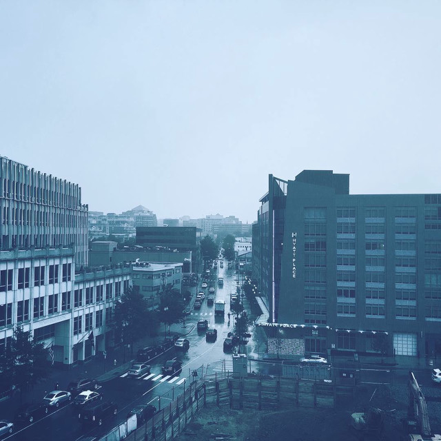 A rainy day photo of Clarendon, VA. Construction is beginning in the photo.