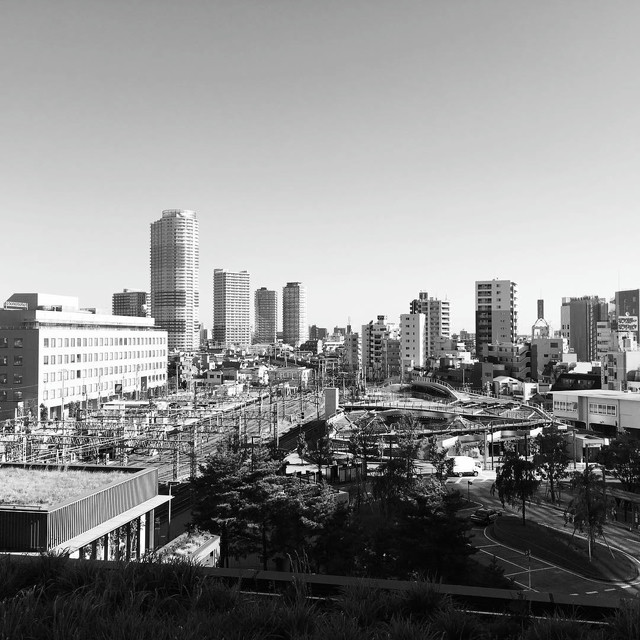 A black and white cityscape photo of an outer-area of Tokyo.